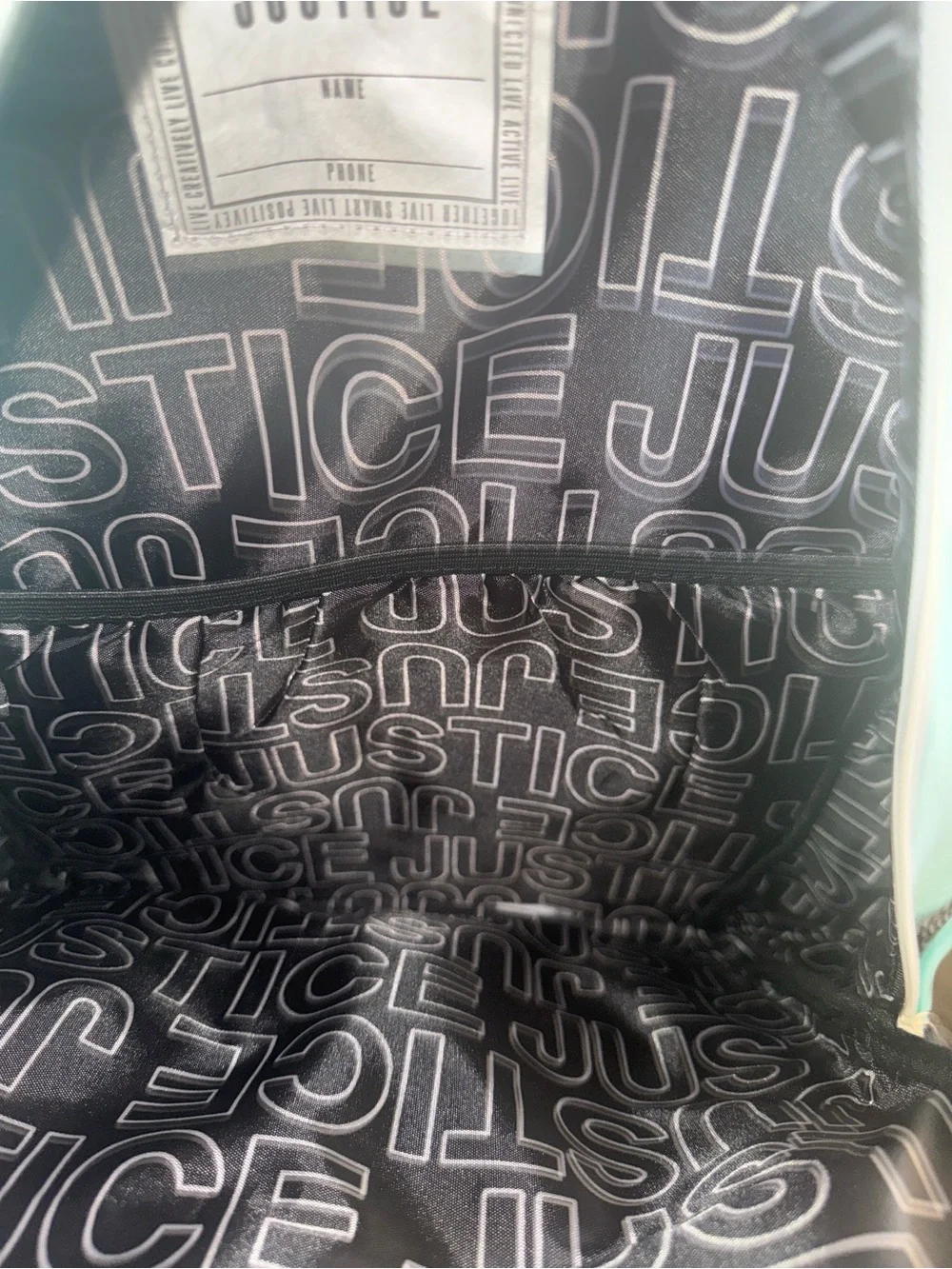 Justice Teal Multicolor Smiley Daisy Holographic Backpack